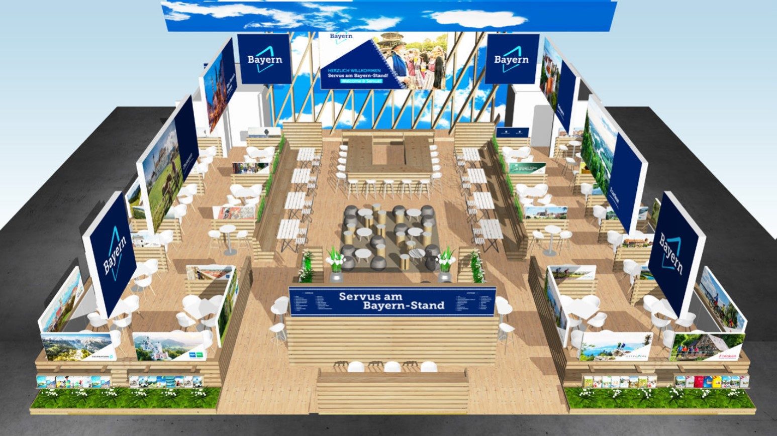 Isometrischer Bayern-Stand auf der ITB Berlin 2026 mit zentralem Thekenbereich, Sitzgruppen und Bannern.